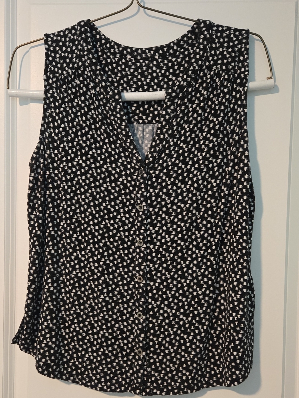 Sleeveless Black and White Button-Front Blouse